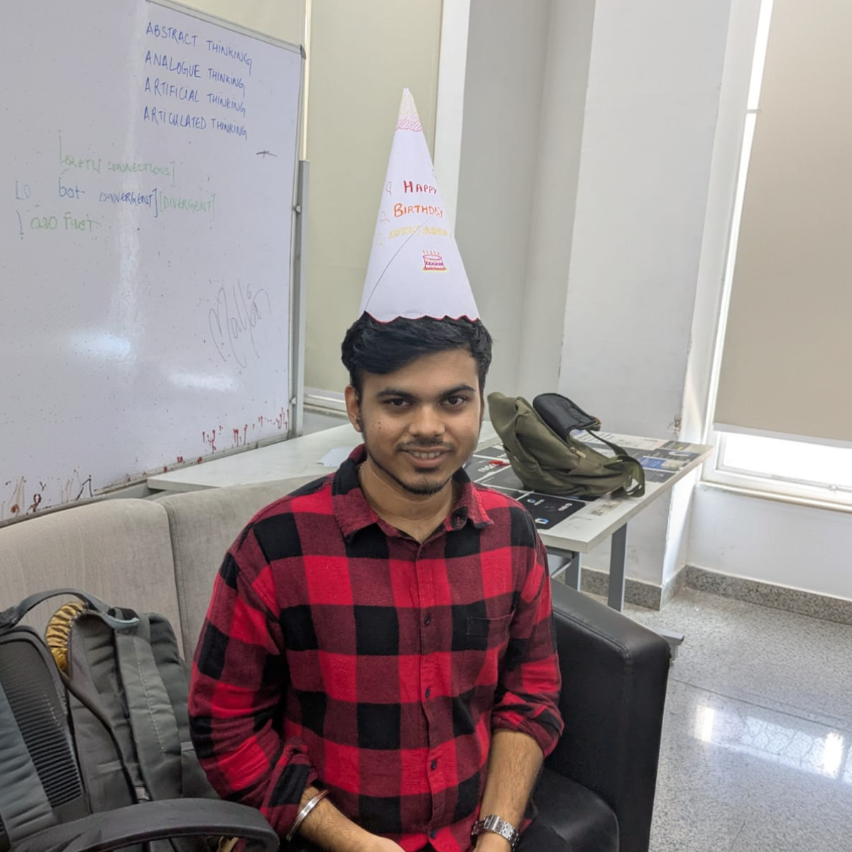 Cake day in the studio. The hat was not optional.